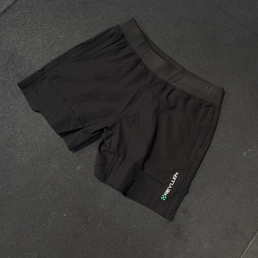reyllen workout shorts black flat on floor