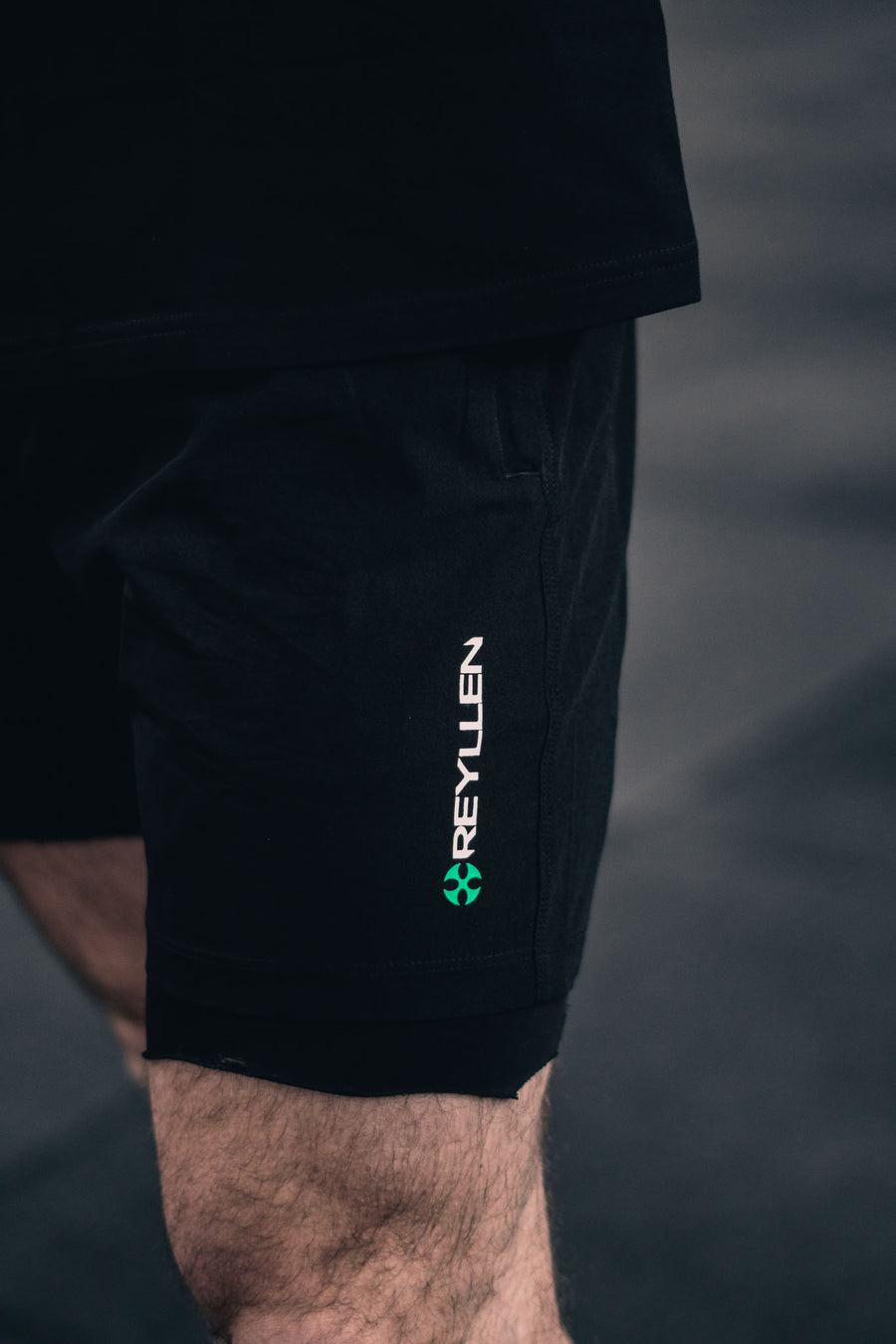reyllen workout shorts black logo closeup